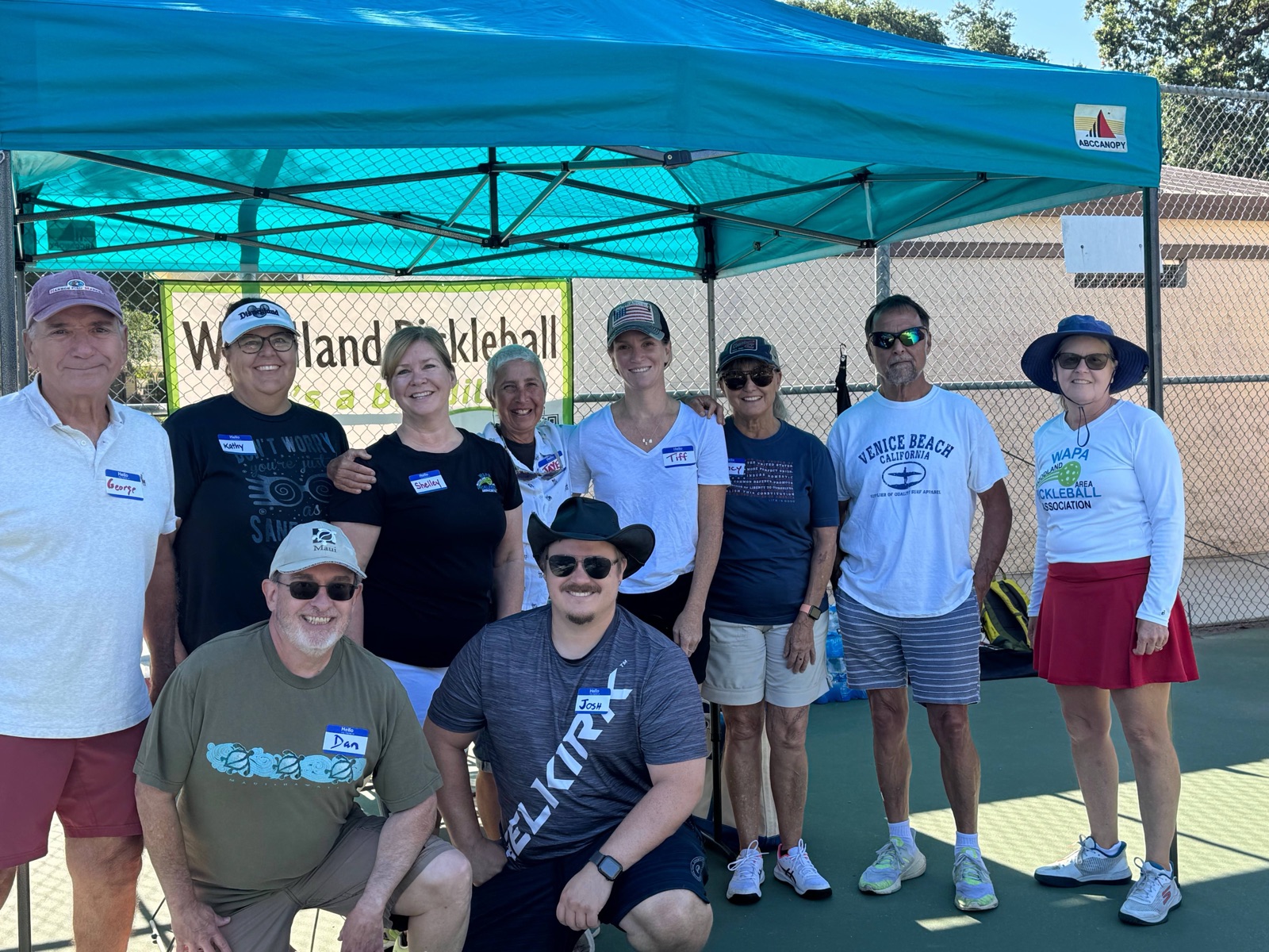 WAPA members and volunteers under the club canopy at Beamer Park